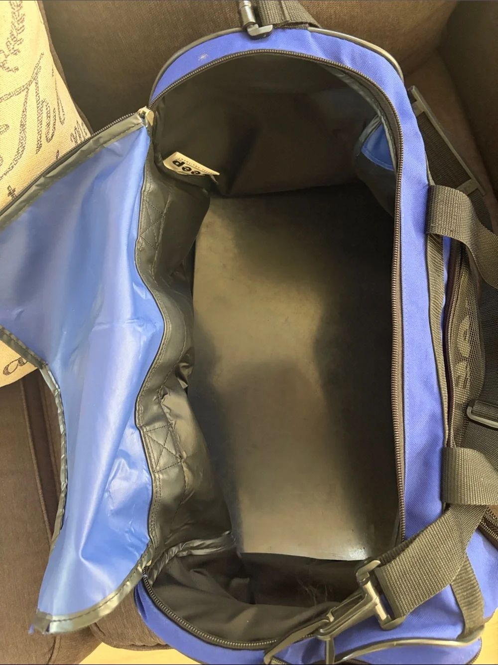 Jeep blue and black duffel bag with front mesh pocket.